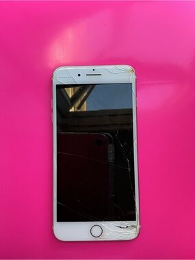 Apple White iPhone with Cracked Front Glass